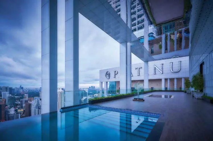 PV Face Suites Rooftop infinity pool with city skyline view and building facade in Jalan Sultan Ismail, Freehold property development, photo