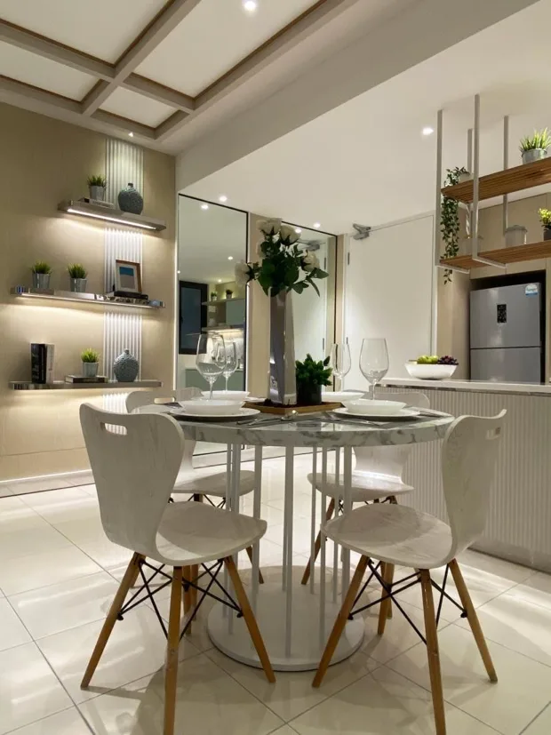 Aster Hill Image shows a dining area with a round table, four chairs, and decorative shelves. in Kuala Lumpur, Freehold property development, photo