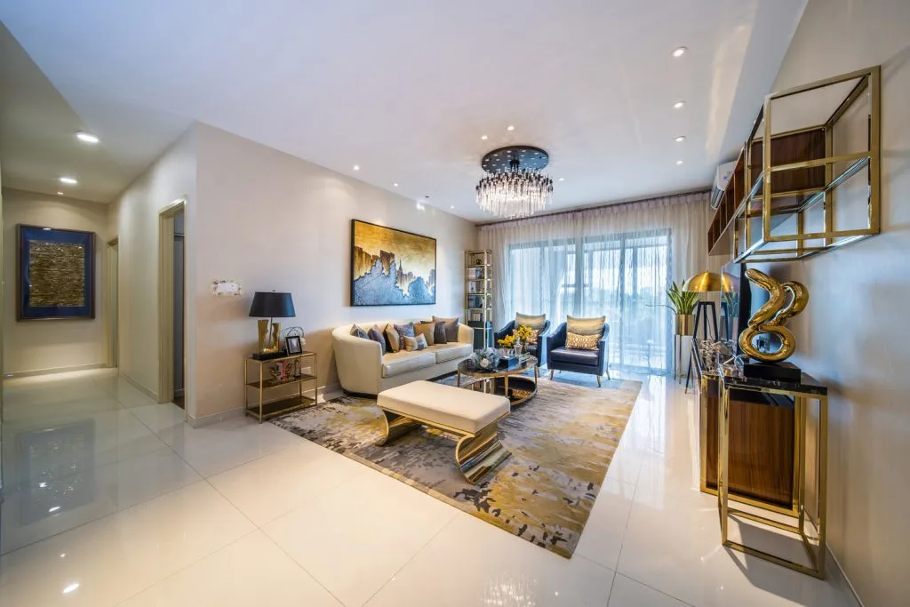  Country Garden Central Park This image shows the interior of a living room with a sofa, coffee table, and dining area. in Johor Bahru, Freehold property development, photo