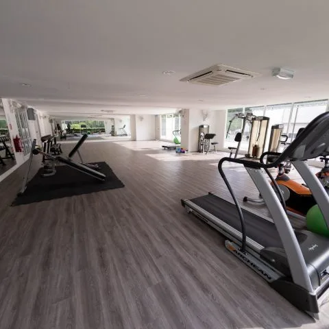 Emerald Residence The image shows the gym facility with various exercise equipment. in Teluk Kumbar, Freehold property development, photo