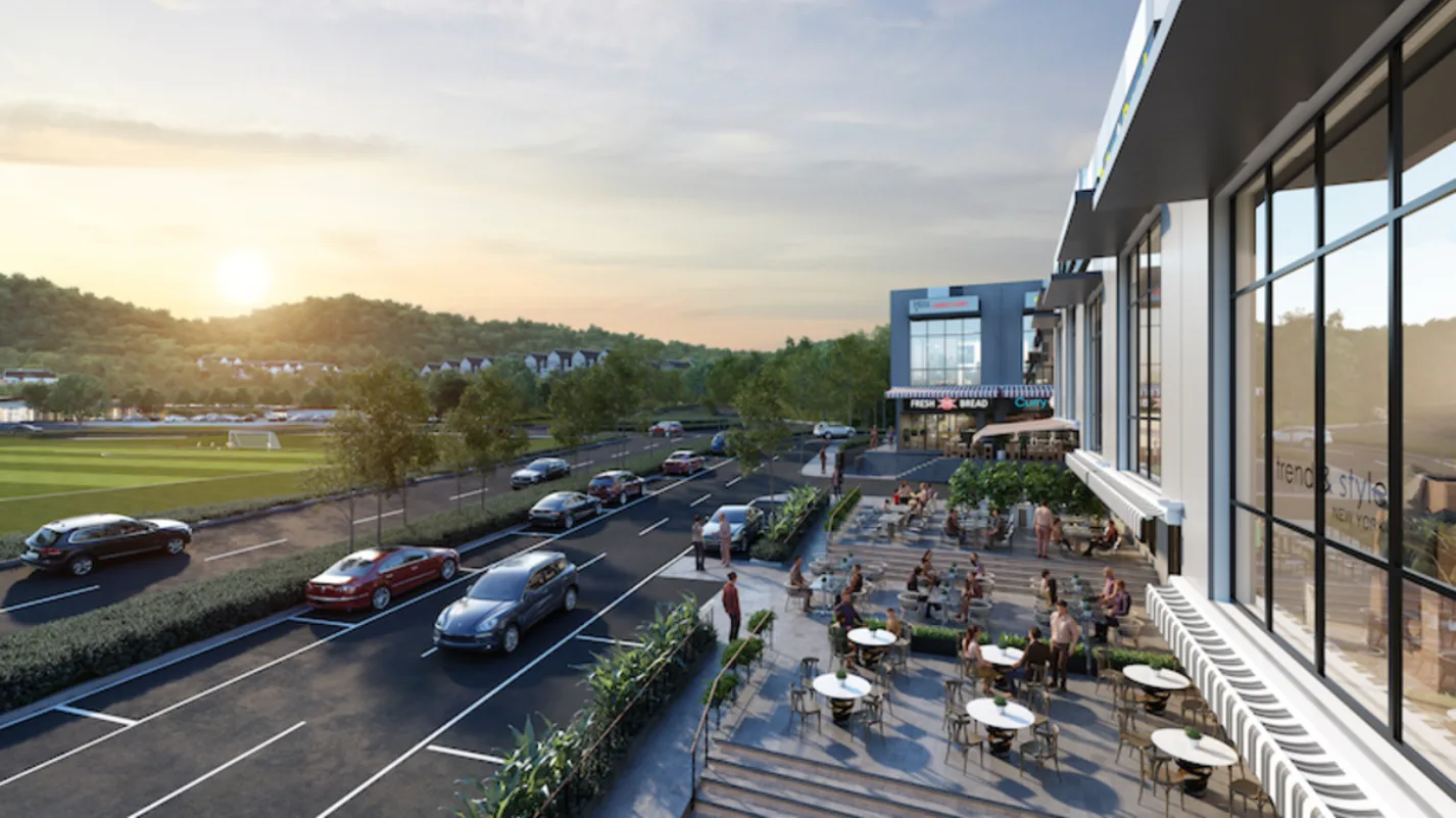 Gamuda Gardens Exterior render of commercial area with outdoor seating and road in Rawang, Leasehold property development, render