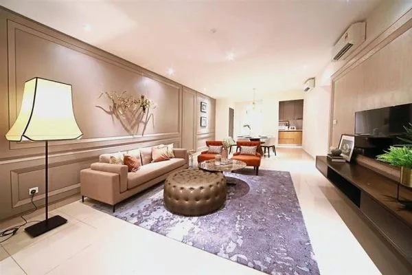 Gem Residences Image shows the interior of a living room with a sofa, chairs, coffee table, and TV console., Freehold property development, photo