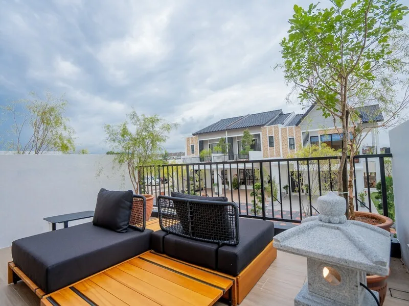 JIA @ Ipoh South Image shows a balcony with outdoor furniture and a view of the building exterior. in Ipoh, Leasehold property development, photo
