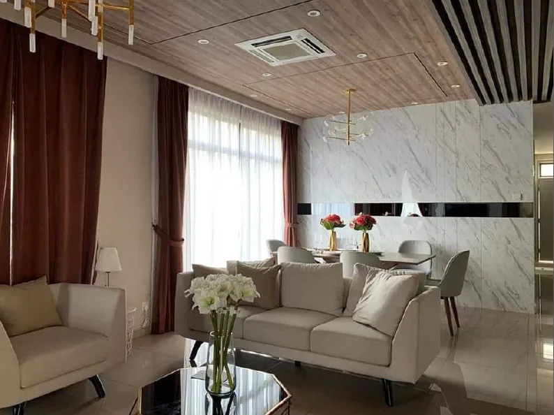 Taman Bestari Indah - KSL Lily Living room with sofa, armchair, dining table and marble wall, Freehold property development, photo