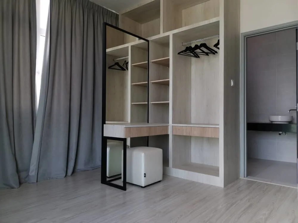 KSL Mutiara Bestari Taman Nusa Bestari Image shows a bedroom interior with a built-in wardrobe, dressing table, stool, and a glimpse into the bathroom. in Skudai, Freehold property development, photo