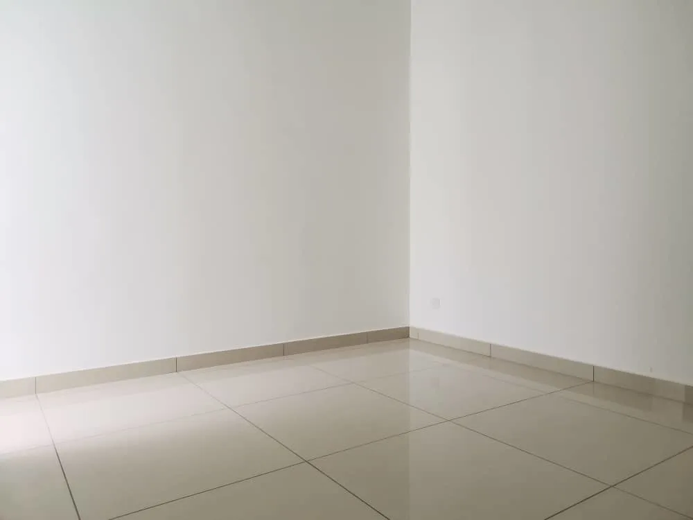 KSL Mutiara Bestari Taman Nusa Bestari An empty room with tiled floor and a large window showing the exterior of the property. in Skudai, Freehold property development, photo