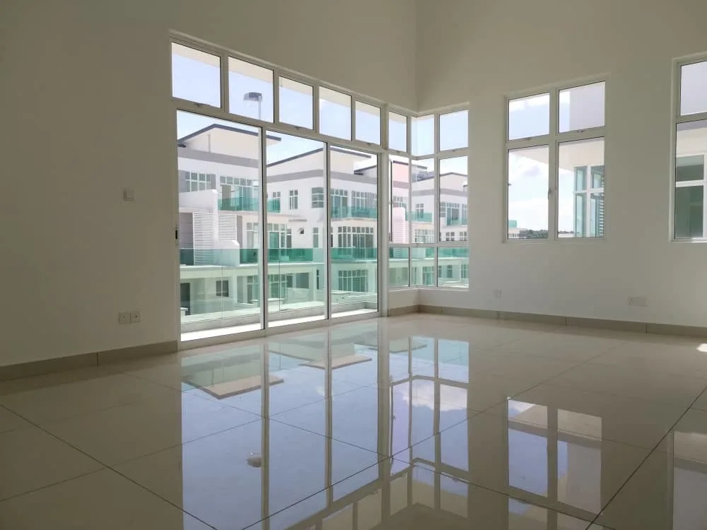 KSL Mutiara Bestari Taman Nusa Bestari Image shows an empty room with large windows and a view of other buildings. in Skudai, Freehold property development, photo