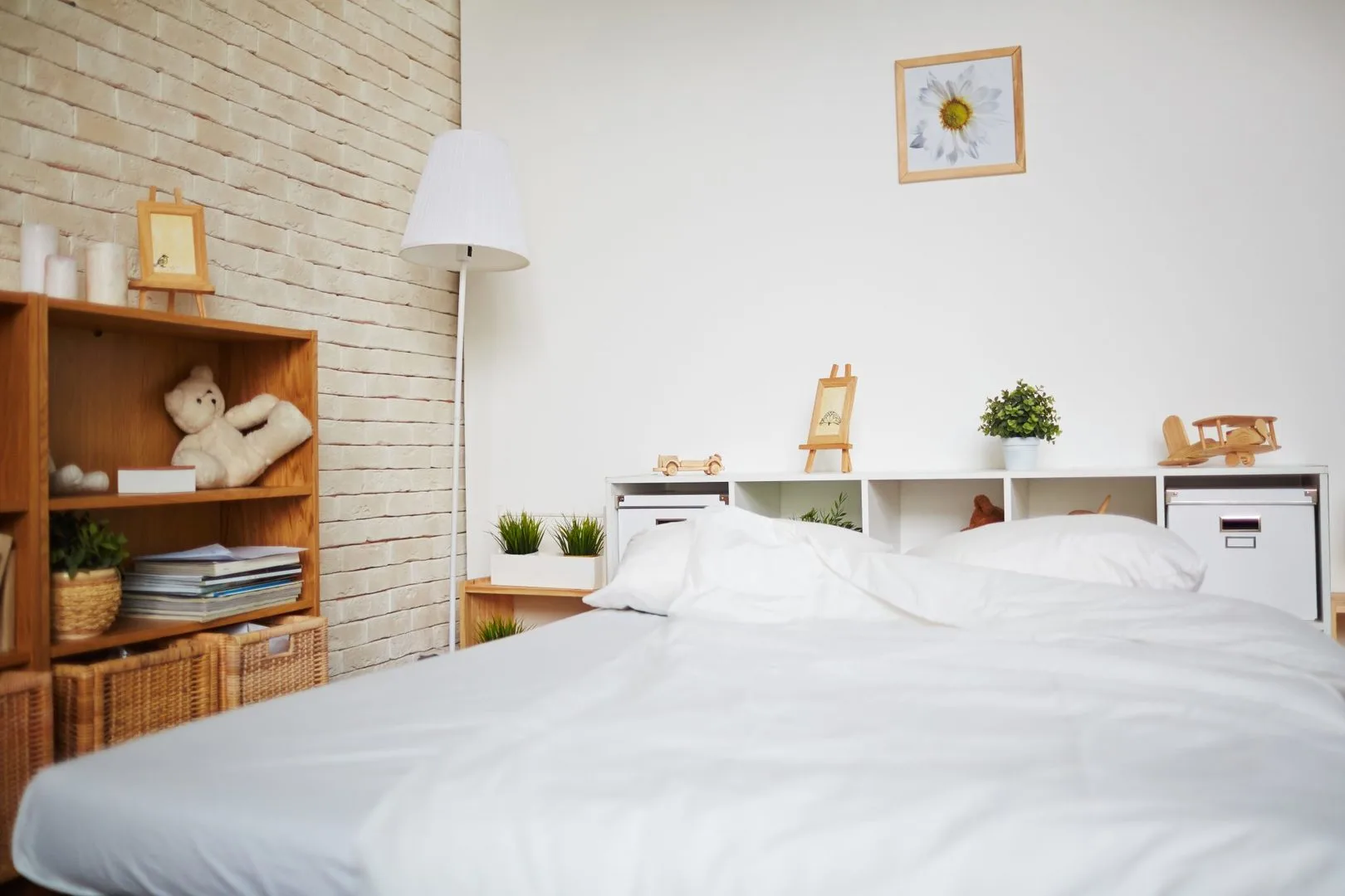Livista Bandar Sri Damansara A bedroom with a bed, shelving unit, and decorations. in Bandar Sri Damansara, Freehold property development, photo