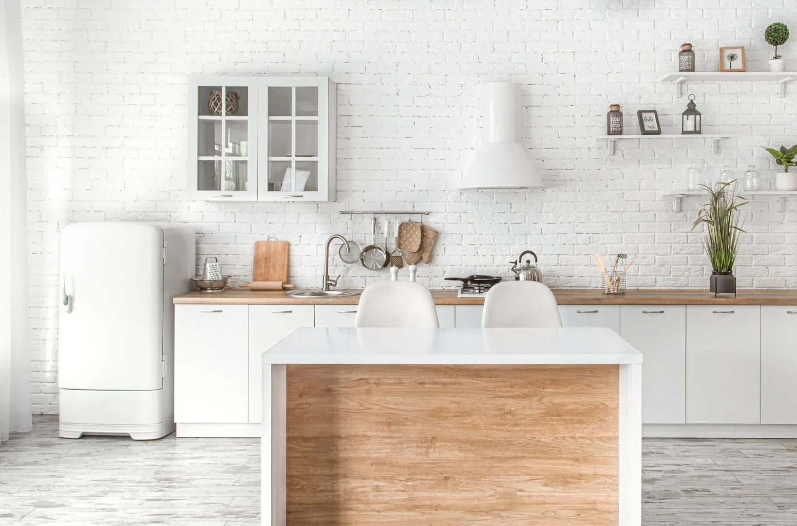 Livista Bandar Sri Damansara A bright kitchen with white brick walls, white cabinets, a wooden island, and a retro-style refrigerator. in Bandar Sri Damansara, Freehold property development, photo
